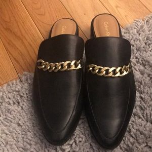 Calvin Klein mules with gold chain detailing